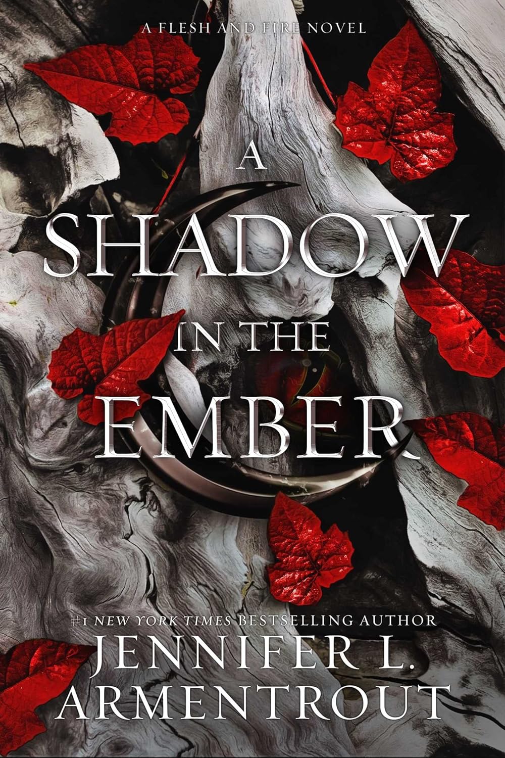 Book cover of 'A Shadow in the Ember' by Jennifer L. Armentrout with red leaves and a metallic object.