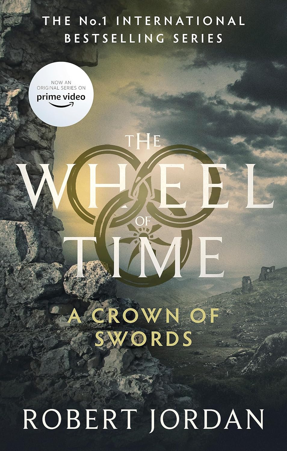 Book cover of 'A Crown of Swords' from 'The Wheel of Time' series with a scenic background.